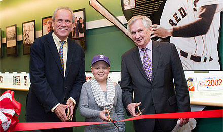 Larry Lucchino, pediatric patient Gianna Martiniellonew, and Dana-Farber President and CEO Edward J. Benz Jr., MD