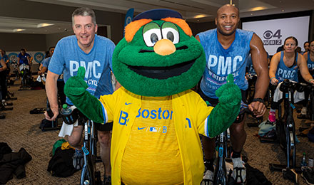 PMC Winter Cycle participants with Wally at Fenway Park